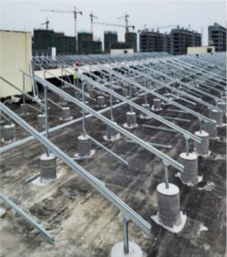 Concrete roof ballasted PV structure